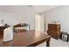 Bright bedroom featuring neutral walls, a door, and carpeted floors at 12272 Rangeland Blvd, Odessa, FL 33556