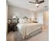 Comfortable bedroom with soft lighting, carpeted floors, and an open doorway at 12272 Rangeland Blvd, Odessa, FL 33556