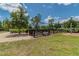 Dog park with a bench and plenty of space for your furry friend to run around at 12272 Rangeland Blvd, Odessa, FL 33556