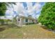 Well-maintained house with landscaped backyard and white rock ground cover at 12478 Prescott St, Spring Hill, FL 34609