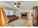 Spacious living room with wood floors, comfortable seating, and stylish décor at 12478 Prescott St, Spring Hill, FL 34609