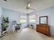 Bedroom featuring a ceiling fan and an abundance of natural light from dual windows, perfect for a home office at 1280 Thornton Ct, Spring Hill, FL 34608