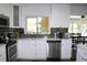 Beautiful kitchen featuring stainless steel appliances and bright countertops at 1540 Lime St, Clearwater, FL 33756