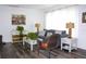 Bright, well lit living room with modern flooring, neutral paint, and curated furnishings at 1540 Lime St, Clearwater, FL 33756