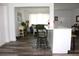Open-concept living area with stylish furniture, light-filled windows, and modern decor at 1540 Lime St, Clearwater, FL 33756