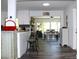 Open concept living space featuring a dining area and barstool seating at the kitchen counter at 1540 Lime St, Clearwater, FL 33756