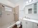 Bathroom with shower, toilet, and vanity at 18308 Valor Path, Brooksville, FL 34604
