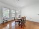 Charming breakfast nook with hardwood floors and multiple windows at 18308 Valor Path, Brooksville, FL 34604