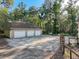 A large detached three-car garage at 18308 Valor Path, Brooksville, FL 34604