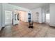 Open-concept room with tile flooring, decorative columns, and stylish details creating an inviting atmosphere at 18308 Valor Path, Brooksville, FL 34604