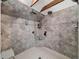 Spacious walk-in shower featuring dual shower heads and tiled walls at 18308 Valor Path, Brooksville, FL 34604