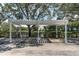 Community car washing area with pergola, vacuum and beautiful landscaping at 3260 Haviland Ct # 201, Palm Harbor, FL 34684