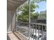 Screened patio with nice views of the community and outdoor seating with an exterior door at 3260 Haviland Ct # 201, Palm Harbor, FL 34684