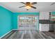 Dining area featuring sliding glass doors leading to outdoor space, and an adjacent modern kitchen at 3362 Minnow Creek Dr, Hernando Beach, FL 34607