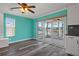 Dining room with view of exterior, featuring sliding glass doors to outdoors and sleek, modern features at 3362 Minnow Creek Dr, Hernando Beach, FL 34607