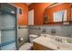Bathroom featuring blue tiling and a vanity at 37623 Florida Ave, Dade City, FL 33525