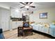 Cozy studio apartment with modern kitchenette, bed, and comfortable seating at 417 Inness Dr, Tarpon Springs, FL 34689