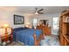 Comfortable bedroom featuring classic decor, a spacious layout, and natural lighting at 4647 Gazebo Ct, New Port Richey, FL 34655