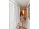 Hallway with closet and view of the main bedroom at 4647 Gazebo Ct, New Port Richey, FL 34655