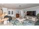 Comfortable living room with modern flooring and a view of the front porch at 4647 Gazebo Ct, New Port Richey, FL 34655