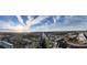 Panoramic aerial view of the waterfront community and the canal leading to the ocean and blue skies at 4678 Marine Pkwy # 305, New Port Richey, FL 34652
