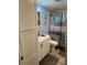Contemporary bathroom with storage cabinet and modern fixtures and shower with sliding glass doors at 4678 Marine Pkwy # 305, New Port Richey, FL 34652