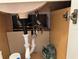Plumbing under the sink appears to be in need of repair, with exposed pipes and old fixtures at 4678 Marine Pkwy # 305, New Port Richey, FL 34652