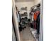 Organized walk-in closet with shelving and hanging space, providing ample storage for clothes and accessories at 4678 Marine Pkwy # 305, New Port Richey, FL 34652
