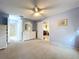 Large bedroom with view to bathroom and living room at 4836 Alamo Ct, New Port Richey, FL 34655