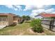 Fenced backyard offers plenty of space for outdoor activities and gardening at 5092 Roble Ave, Spring Hill, FL 34608