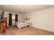 Neutral bedroom featuring a ceiling fan, carpeted floors and a comfortable bed at 5092 Roble Ave, Spring Hill, FL 34608