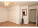 This bedroom features carpet, a ceiling fan, a closet, a window, and neutral paint at 5092 Roble Ave, Spring Hill, FL 34608