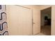 Hallway with closet and doorway leading into another room at 5092 Roble Ave, Spring Hill, FL 34608