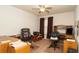 This office features neutral carpet, a lighted ceiling fan, a printer, and 2 desks at 5092 Roble Ave, Spring Hill, FL 34608