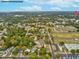 An aerial view showing the home's proximity to Sim's Park and other businesses at 6329 Alaska Ave, New Port Richey, FL 34653
