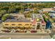 Elevated streetscape view highlighting commercial buildings with architectural details and street-side parking at 6329 Alaska Ave, New Port Richey, FL 34653