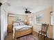 Comfortable bedroom with natural light, ceiling fan, and a calming atmosphere at 6329 Alaska Ave, New Port Richey, FL 34653