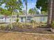 Charming home with well-maintained landscaping and a welcoming front exterior at 6329 Alaska Ave, New Port Richey, FL 34653