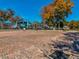 Open park with shaded structures, lush greenery, and brick-paved area for recreational activities at 6329 Alaska Ave, New Port Richey, FL 34653