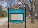 The sign for James E. Grey Preserve is displayed with information about the park at 6329 Alaska Ave, New Port Richey, FL 34653