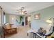 Living area with tile flooring, neutral paint, and futon couch provides space to relax at 6335 Kings Ct, New Port Richey, FL 34653