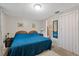 Main bedroom with view to an ensuite bathroom and closet at 6335 Kings Ct, New Port Richey, FL 34653