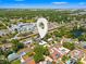 An aerial view of the home in a community near parks, commercial areas and other homes at 7230 17Th N Ln, St Petersburg, FL 33702