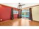 Bedroom with sliding glass doors provides access to the pool area, flooding the room with light at 7230 17Th N Ln, St Petersburg, FL 33702