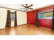 Spacious bedroom features stylish ceiling fan, tile floors, and natural light from the windows at 7230 17Th N Ln, St Petersburg, FL 33702