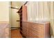 Custom closet with built-in shelving and drawers for optimal storage and organization at 7230 17Th N Ln, St Petersburg, FL 33702