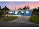 Charming single-story home with a well-maintained lawn, a welcoming atmosphere, and tasteful blue exterior paint at 7230 17Th N Ln, St Petersburg, FL 33702