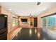Spacious kitchen featuring modern appliances, ample countertop space, and views to the pool at 7230 17Th N Ln, St Petersburg, FL 33702