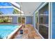 Tiled pool deck with access to house and screened lanai, great for entertaining at 7230 17Th N Ln, St Petersburg, FL 33702