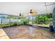 Spacious screened patio offering additional outdoor living space and views of the landscaped yard at 7230 17Th N Ln, St Petersburg, FL 33702